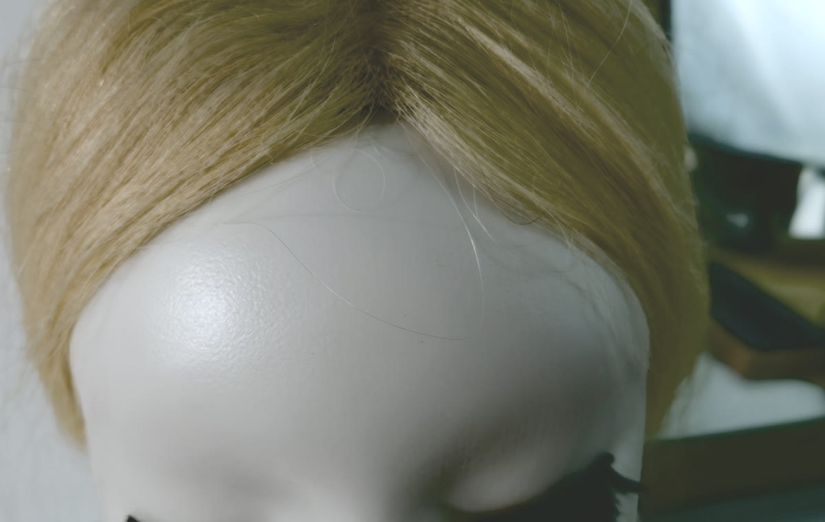 Before: natural part at the crown, no piece clipped in