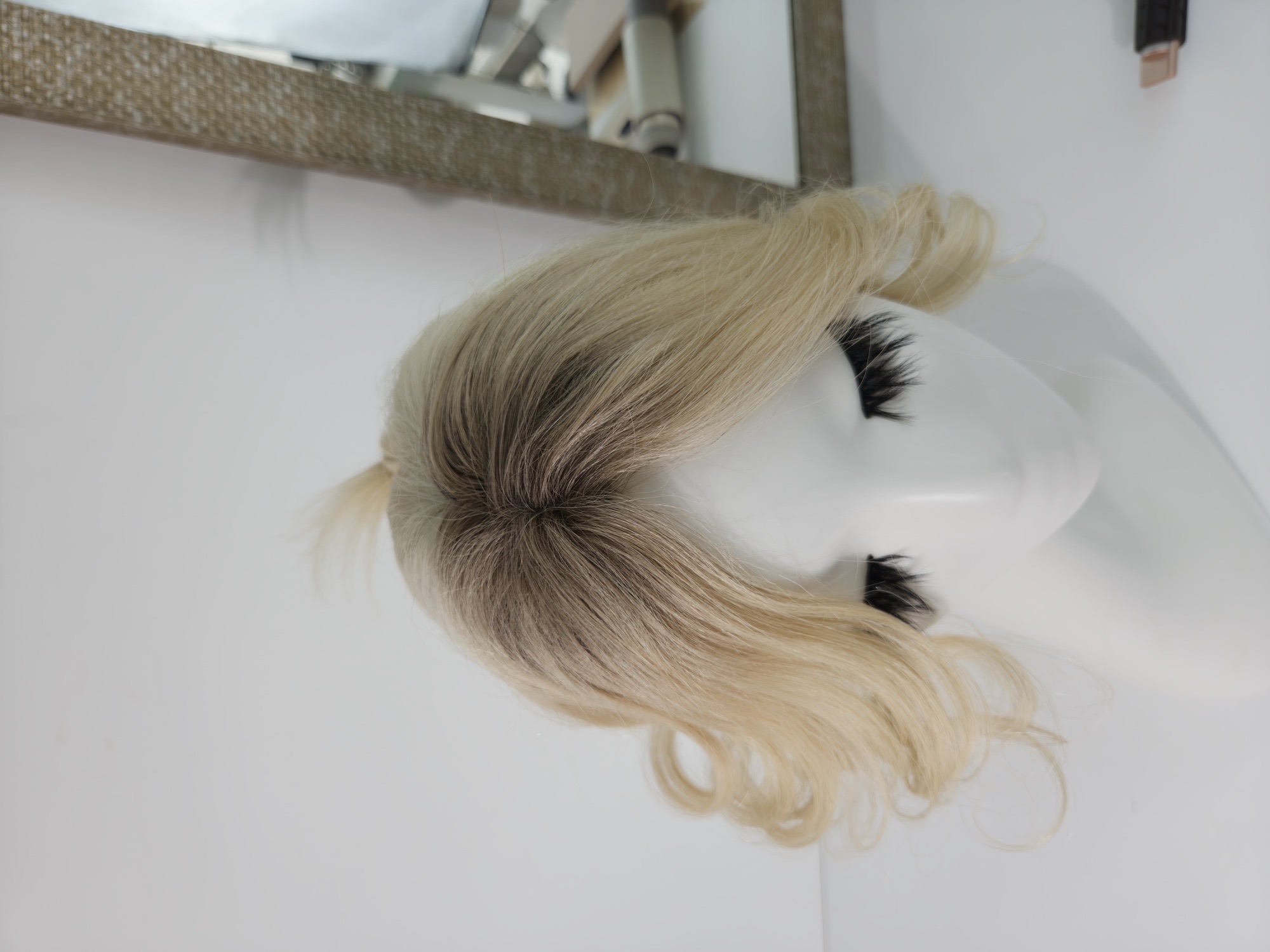 The finished Hybrid Bang look, front view on the studio head